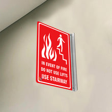 Load image into Gallery viewer, In Event Of Fire Do Not Use Lifts Use Stairway – Double-Sided Off-Wall Sign
