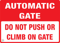 Automatic Gate - Do Not Push Or Climb On Gate sign