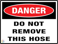 Danger<br/> Do Not Remove<br/> This Hose