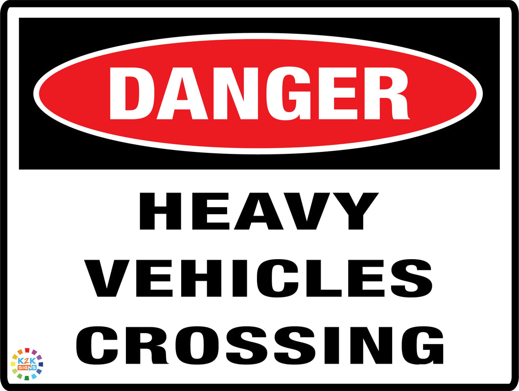Danger - Heavy Vehicles Crossing Sign