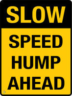 Slow Down Hump Ahead Sign