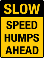 Slow - Speed Humps Ahead Sign