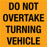 Do Not Overtake Turning Vehicle Sign